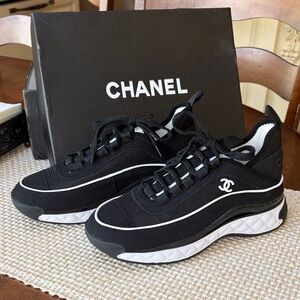 NEW IN BOX CHANEL LOGO Black/White Quilted Sneakers (RUNS SMALL)